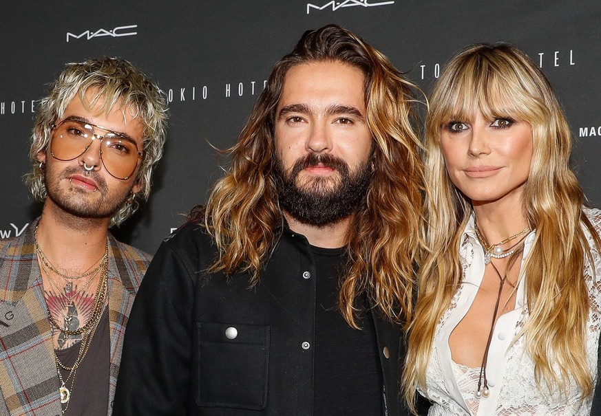 ARCHIV - 24.09.2020, Berlin: Bill Kaulitz, Tom Kaulitz und Heidi Klum kommen zu einer Veranstaltung rund um die Band Tokio Hotel in Berlin. (zu dpa: ««Keine Tränen mehr»: Kaulitz-Brüder und Klum traue ...