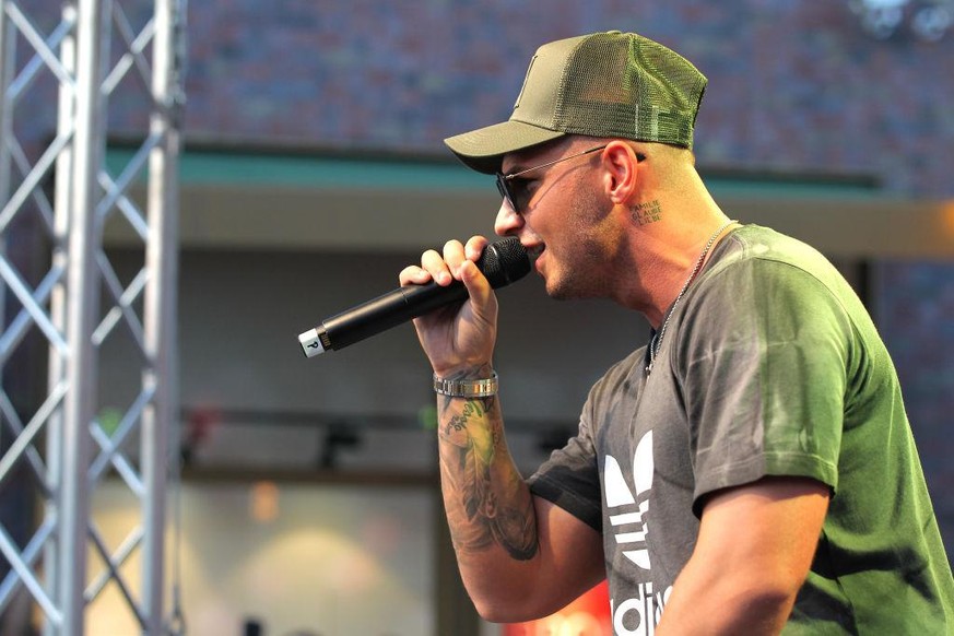 SOLTAU, GERMANY - AUGUST 03: Pietro Lombardi performs at the Late Night Shopping at Designer Outlet Soltau on August 3, 2018 in Soltau, Germany. (Photo by Mathis Wienand/Getty Images for Designer Outl ...