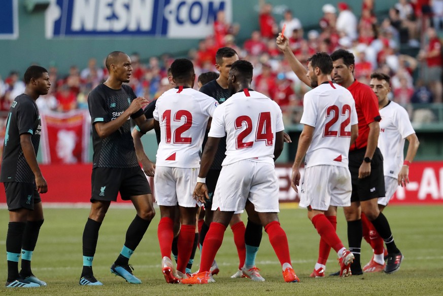 BOSTON, MA - JULY 21: Sevilla FC defender Joris Gnagnon (24) is red carded during a club friendly between Liverpool FC and Sevilla FC on July 21, 2019, at Fenway Park in Boston, Massachusetts. (Photo  ...