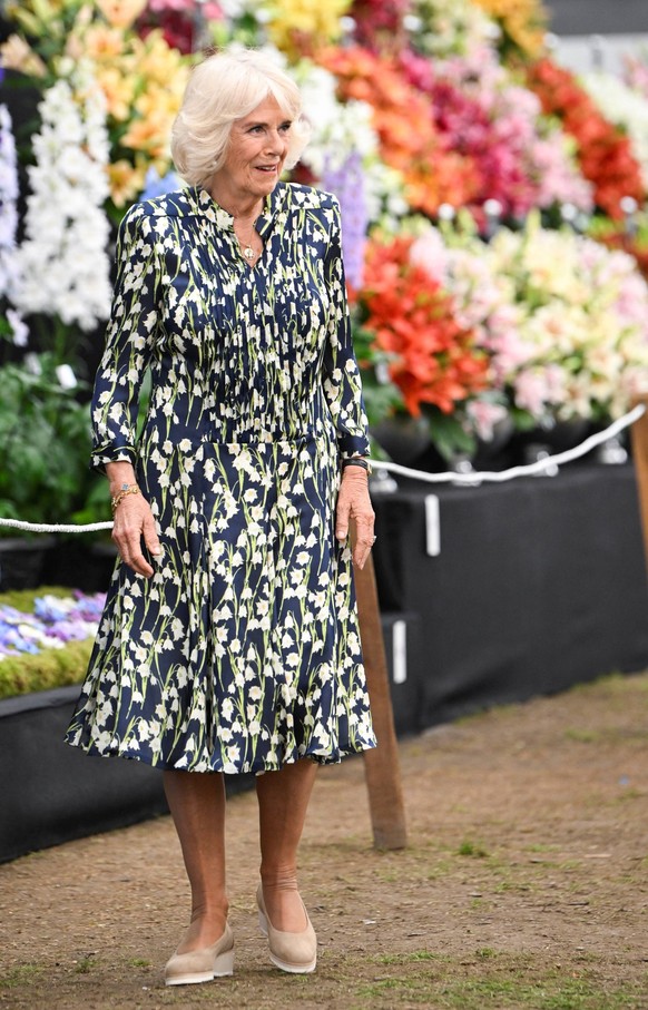 . 22/05/2023. London, United Kingdom. King Charles III and Queen Camilla at the Chelsea Flower Show in London. PUBLICATIONxINxGERxSUIxAUTxHUNxONLY xPoolx/xi-Imagesx IIM-24395-0013