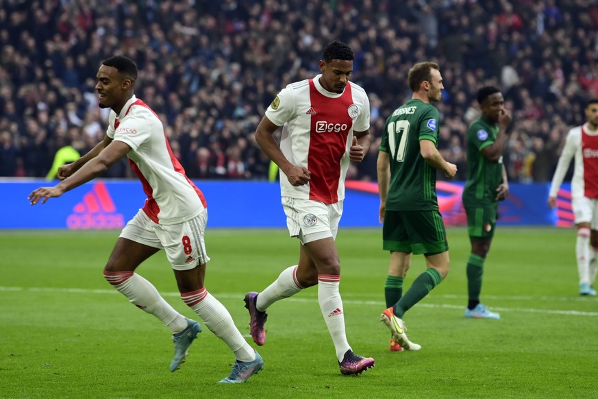 AMSTERDAM - lr Ryan Gravenberch of Ajax, Sebastien Haller of Ajax celebrate the 1-1, Fredrik Aursnes of Feyenoord during the Dutch premier league match between Ajax and Feyenoord at the Johan Cruijff  ...