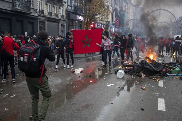 Illustration picture shows incidents during the celebrations of Moroccan supporters and police forces present in the center of Brussels, during a soccer game between Belgium s national team, Nationalt ...