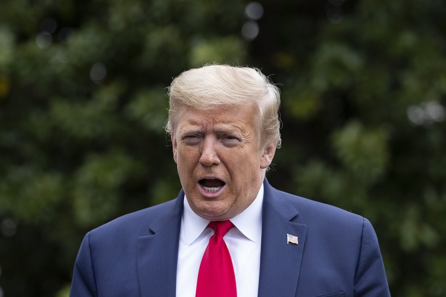 President Donald Trump speaks with reporters on the South Lawn of the White House in Washington, Sunday, May 17, 2020. Trump is returning from a visit to nearby Camp David, Md. (AP Photo/Alex Brandon)