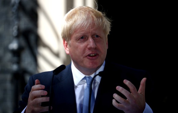 FILE PHOTO: Britain&#039;s Prime Minister Boris Johnson delivers a speech outside Downing Street in London, Britain July 24, 2019. REUTERS/Hannah McKay/File Picture