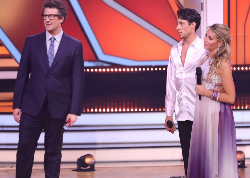 COLOGNE, GERMANY - MARCH 18: Daniel Hartwich, Rene Casselly and Regina Luca are seen on stage during the 4th show of the 15th season of the television competition show &quot;Let&#039;s Dance&quot; at  ...