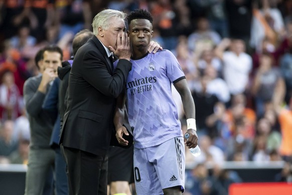 Valencia CF v Real Madrid CF - LaLiga Santander Head coach of Real Madrid Carlo Ancelotti and Vinicius Paixao de Oliveira Junior of Real Madrid during La Liga match between Valencia CF and Real Madrid ...