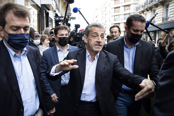 Paris, France, October 2, 2021 - Former French president Nicolas Sarkozy greets his supporters, ahead of a signing session for his new book Promenades Walks. A French court on September 30, 2021 hande ...