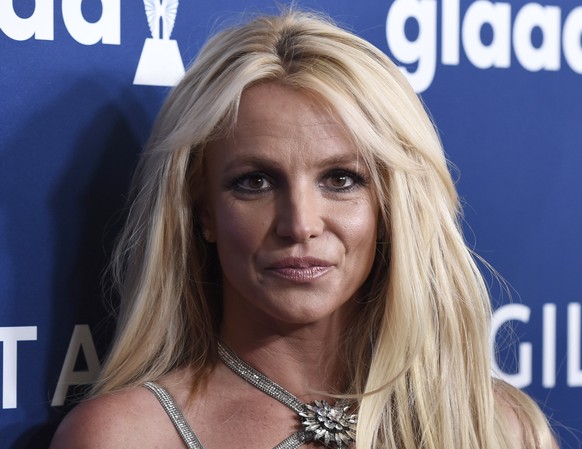 FILE - In this April 12, 2018 file photo Britney Spears arrives at the 29th annual GLAAD Media Awards, in Beverly Hills, Calif. Spears' fight to end the conservatorship that controlled vast aspec ...