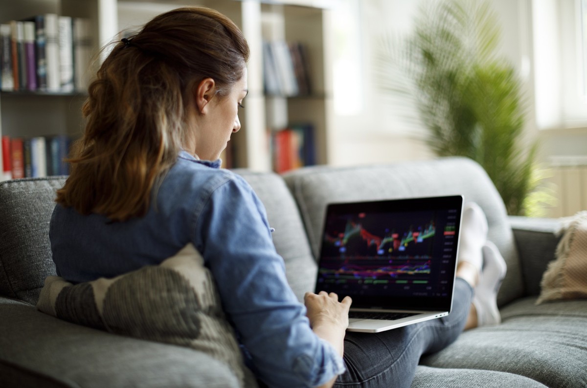 Young woman trading online