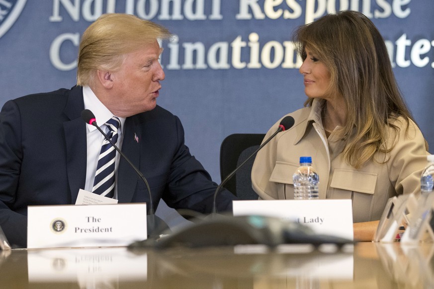 President Donald Trump looks toward first lady Melania Trump at a briefing on this year&#039;s hurricane season at the Federal Emergency Management Agency Headquarters, Wednesday, June 6, 2018, in Was ...