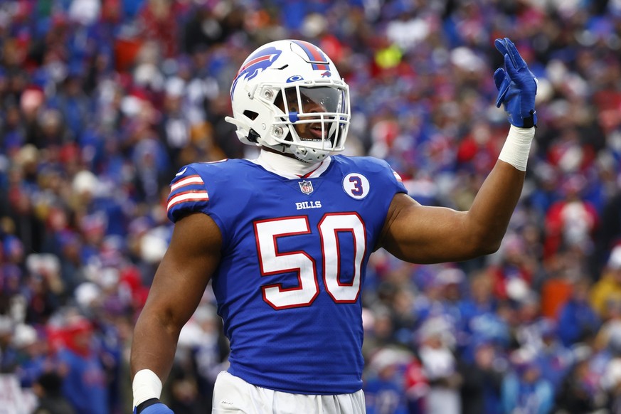 Buffalo Bills defensive end Greg Rousseau (50) celebrates after sacking New England Patriots quarterback Mac Jones by gesturing the number 3 in support of safety Damar Hamlin during the first half of  ...