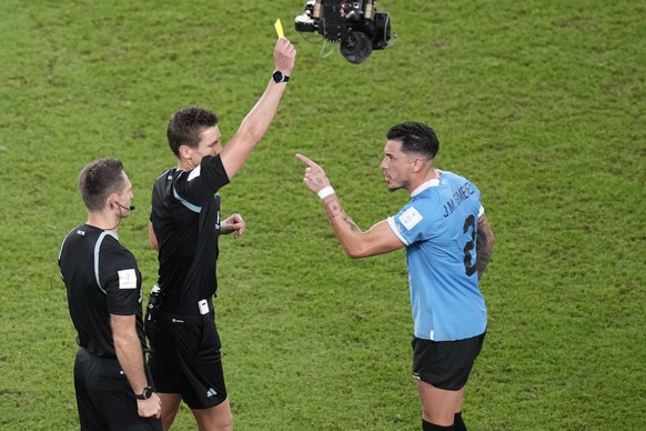 Uruguay's Jose Gimenez gestures to the referee Daniel Siebert at the end of the World Cup group H soccer match between Ghana and Uruguay, at the Al Janoub Stadium in Al Wakrah, Qatar, Friday, Dec. 2,  ...