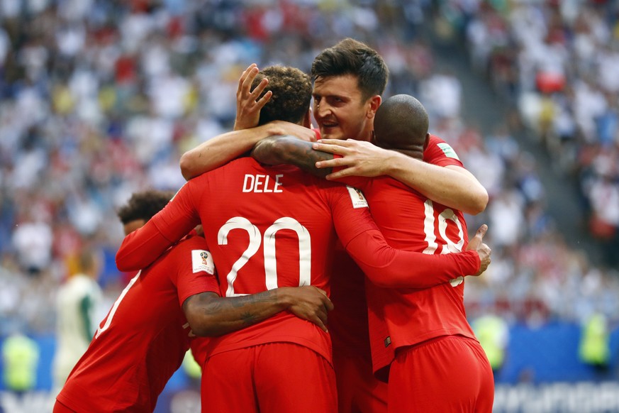 England&#039;s Dele Alli, left, celebrates with England&#039;s Harry Maguire, center and England&#039;s Marcus Rashford, right, after scoring his side&#039;s second goal during the quarterfinal match  ...