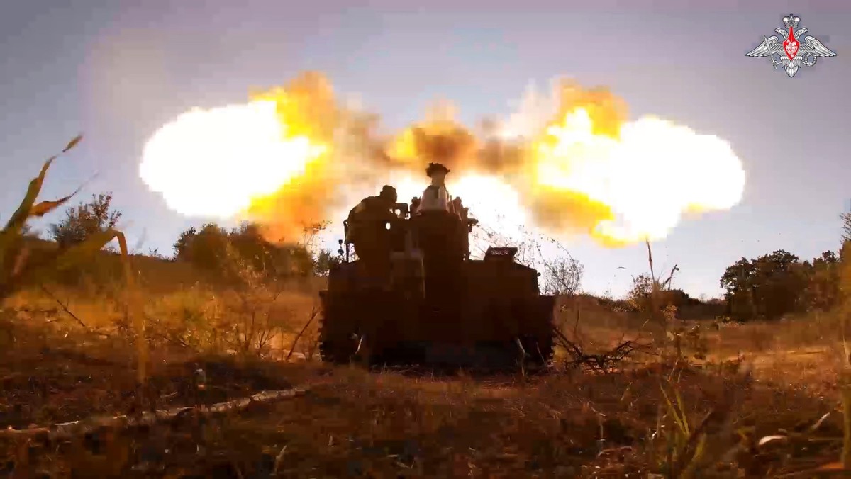In this photo taken from video released by the Russian Defense Ministry on Sunday, Aug. 18, 2024, Russian soldiers fire Giatsint-S self-propelled gun towards Ukrainian positions at an undisclosed loca ...