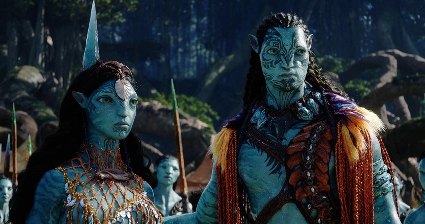 This image released by 20th Century Studios shows Kate Winslet, as Ronal, left, and Cliff Curtis, as Tonowari, in a scene from &quot;Avatar: The Way of Water.&quot; (20th Century Studios via AP)