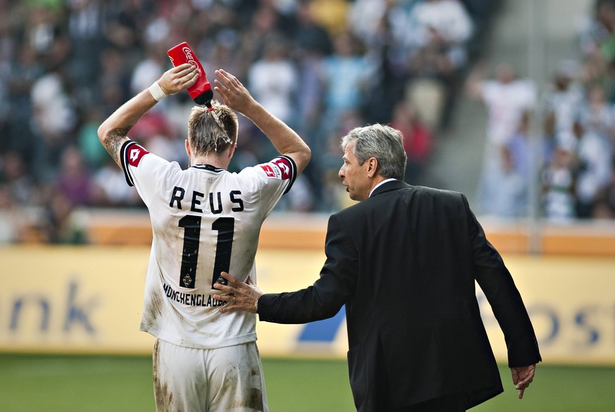 Lucien Favre (r.) und Marco Reus arbeiteten bereits in Gladbach zusammen.