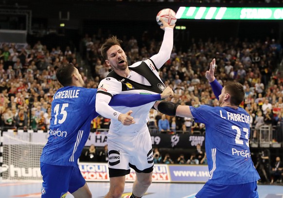 Mathieu Grebille, Fabian Wiede, Ludovic Fabregas / Aktion / Spielszene / Zweikampf / / Handball / Weltmeisterschaft WM Herren / Saison 2018/2019 / 15.01.2019 / Deutschland GER DHB vs.Frankreich FRA /  ...