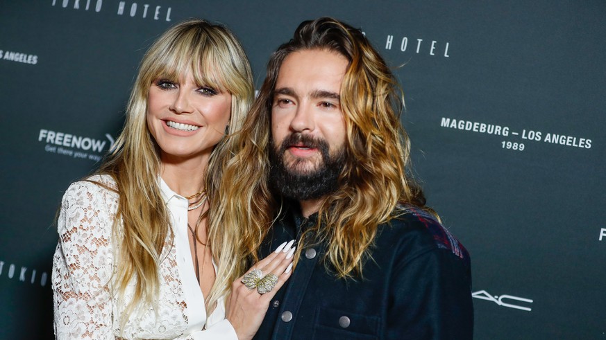 dpatopbilder - 22.10.2021, Berlin: Heidi Klum und Tom Kaulitz kommen zum Tokio Hotel-Event in Berlin. Am Freitag ver