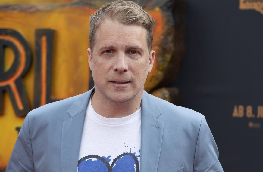 Oliver POCHER, Moderator, Roter Teppich, Red Carpet Show, Ankunft, arrival, Filmpremiere JURASSIC WORLD - EIN NEUES ZEITALTER am 30.05.2022 in Koeln, *** Oliver POCHER, presenter, red carpet, red carp ...