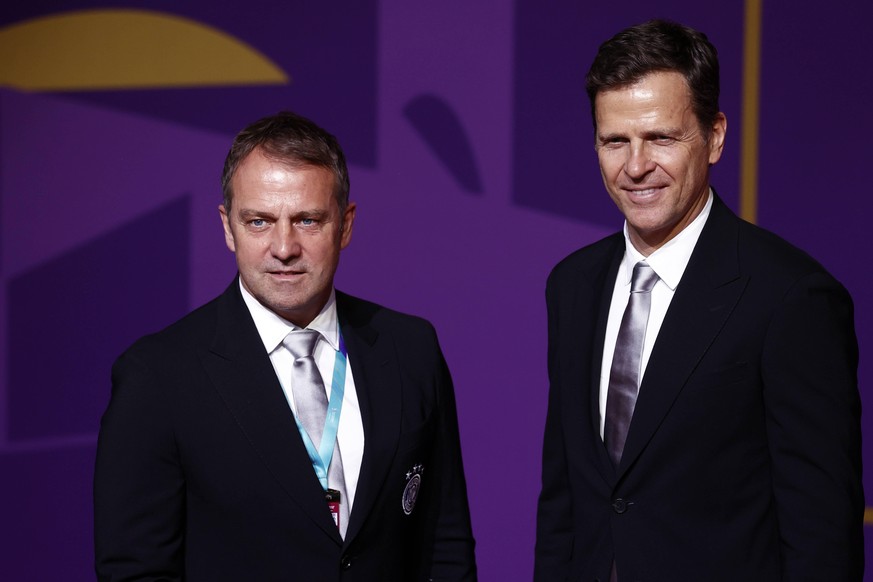 DOHA - lr Germany coach Hansi Flick and Oliver Bierhoff prior to the draw for the 2022 FIFA World Cup, WM, Weltmeisterschaft, Fussball in Qatar at the Doha Exhibition &amp; Convention Center DECC on A ...