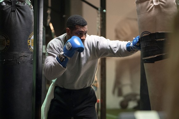 This image released by MGM shows Jonathan Majors in a scene from &quot;Creed III.&quot; (Eli Ade/MGM via AP)