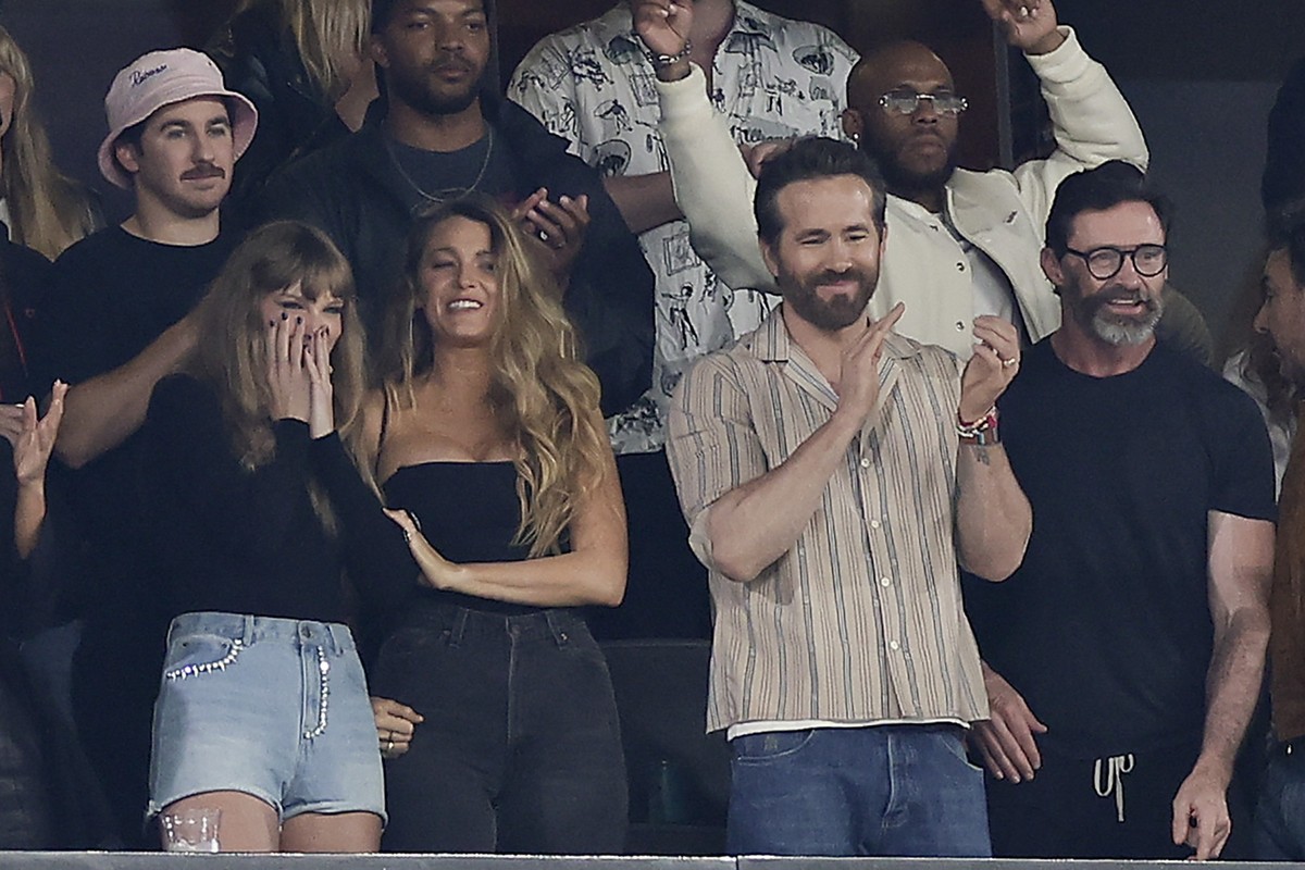 From left, Taylor Swift, Blake Lively, Ryan Reynolds and Hugh Jackman react during the first quarter of an NFL football game between the New York Jets and the Kansas City Chiefs, Sunday, Oct. 1, 2023, ...