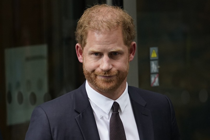 Prince Harry leaves the High Court after giving evidence in London, Tuesday, June 6, 2023. Prince Harry has given evidence from the witness box and has sworn to tell the truth in testimony against a t ...