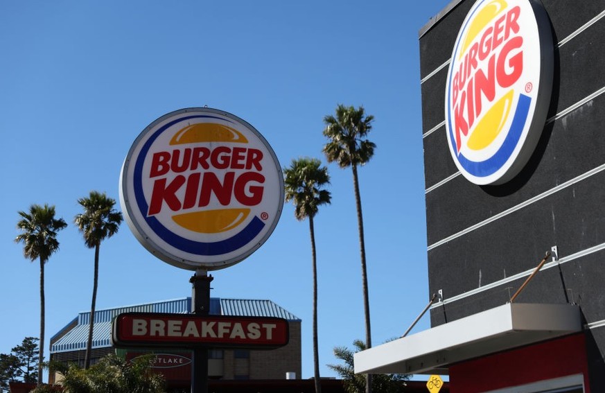 DALY CITY, CALIFORNIA - FEBRUARY 15: A sign is posted in front of a Burger King restaurant on February 15, 2022 in Daly City, California. Restaurant Brands International, the parent company of Burger  ...