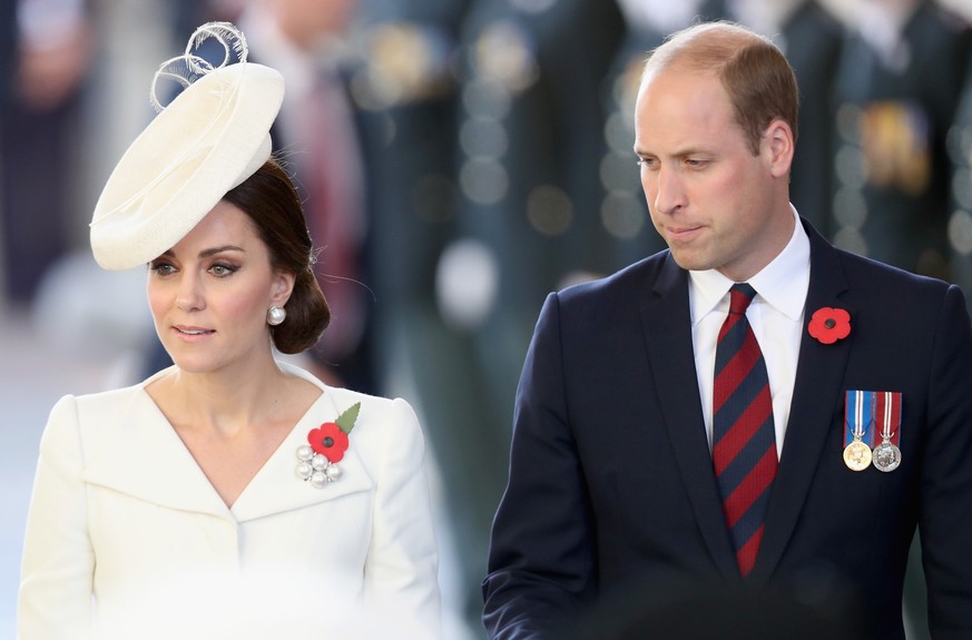 YPRES, BELGIUM - JULY 30: Prince William, Duke of Cambridge and Catherine, Duchess of Cambridge attend the Last Post ceremony, which has taken place every night since 1928, at the Commonwealth War Gra ...