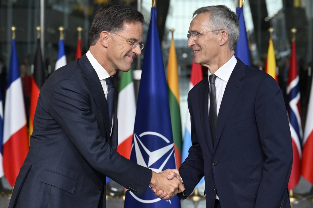 NATO outgoing Secretary General Jens Stoltenberg R and NATO new Secretary General Mark Rutte pictured at a ceremony to mark the end of Stoltenberg s term as NATO Secretary General, in NATO Headquarter ...