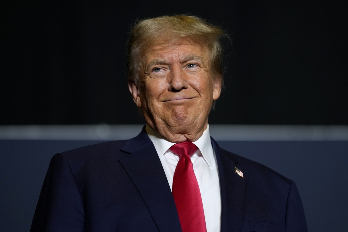 Former President Donald Trump arrives at a commit to caucus rally, Sunday, Oct. 1, 2023, in Ottumwa, Iowa. (AP Photo/Charlie Neibergall)