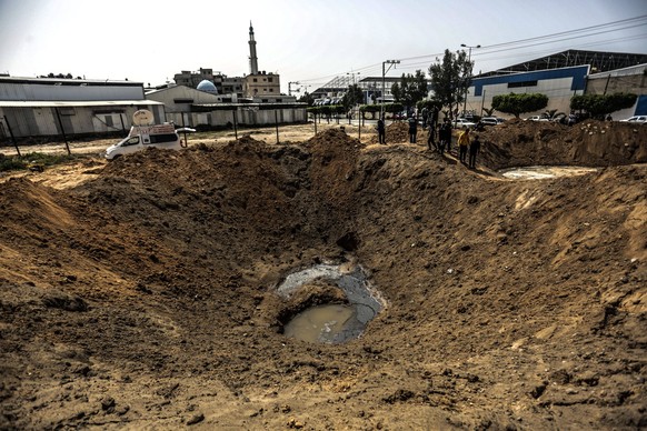 April 7, 2023, Gaza City, The Gaza Strip, Palestine: Palestinians inspect the damage after Israeli air strikes in Gaza City, 07 April 2023. The Israeli military launched airstrikes in the Gaza Strip a ...