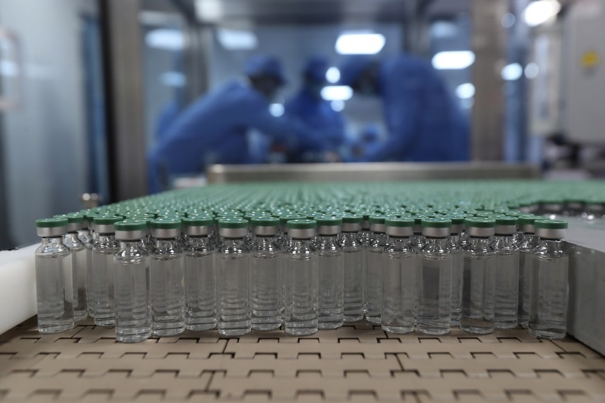 Vials of COVID-19 vaccine are seen before they are packed at the Serum Institute of India, Pune, India, Thursday, Jan. 21, 2021. Serum Institute of India is the world’s largest maker of vaccines and h ...