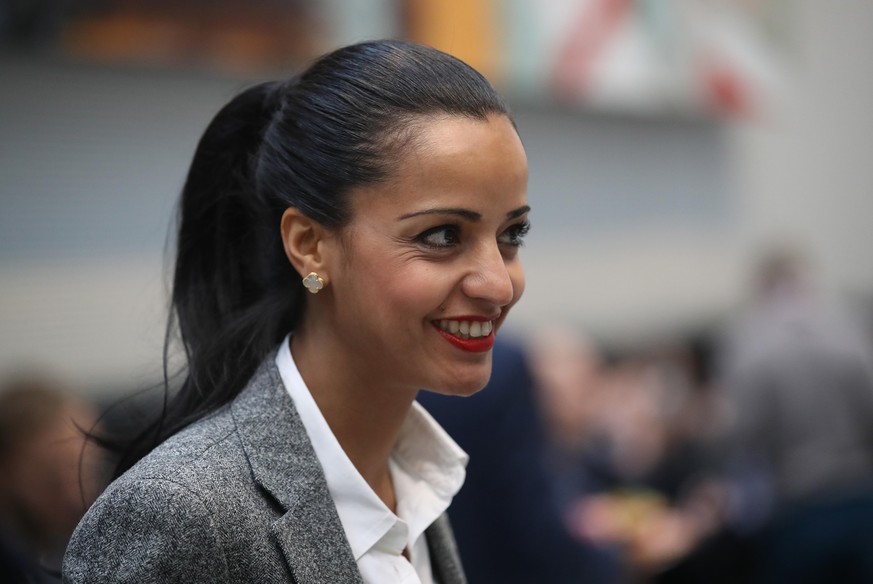 BERLIN, GERMANY - JANUARY 12: Berlin politician and member of the German Social Democrats (SPD) Sawsan Chebli (C) chats with colleagues as she attends a meeting of the SPD Bundestag faction hours afte ...