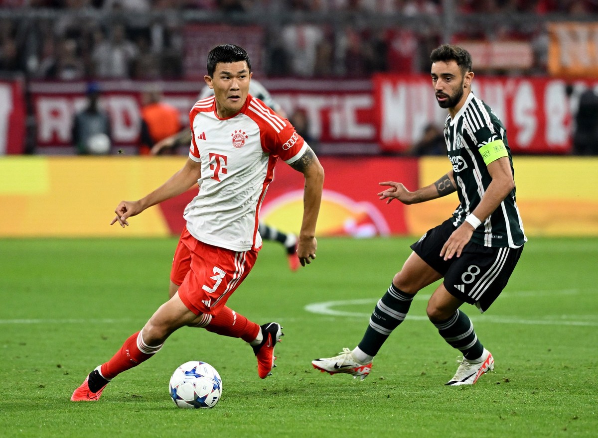 20.09.2023, Bayern, M�nchen: Fu�ball, Champions League, FC Bayern M�nchen - Manchester United, Gruppenphase, Gruppe A, 1. Spieltag, Allianz Arena, Bayerns Min-Jae Kim (l) und Manchesters Bruno Fernand ...