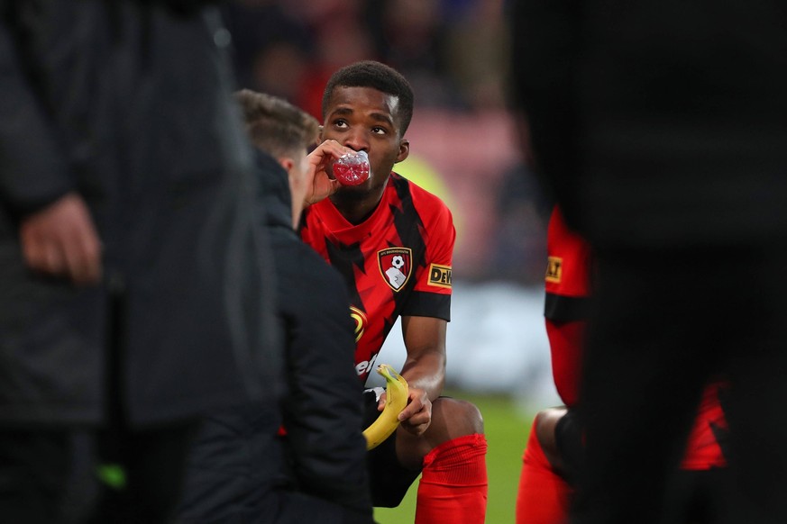 Football - 2022 / 2023 Premier League - AFC Bournemouth vs Brighton and Hove Albion - Vitality Stadium - Wednesday 4th April 2023 Bournemouth s Hamed Traore stops to break there Ramadan fast during th ...