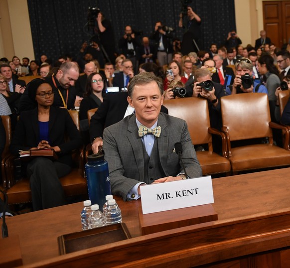 George Kent, the Deputy Assistant Secretary of State for European and Eurasian affairs (L) and William Taylor, the acting Ambassador to Ukraine (R), arrive to testify during the House House Intelligen ...