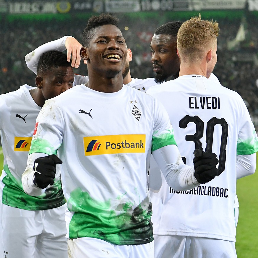 191202 -- MONCHENGLADBACH, Dec. 2, 2019 Xinhua -- Breel Embolo Front of Monchengladbach celebrates during a German Bundesliga match between Borussia Monchengladbach and SC Freiburg in Monchengladbach, ...