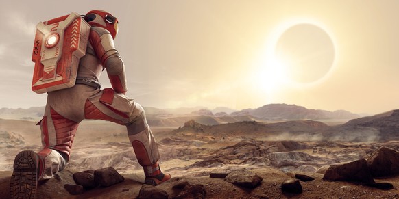 An astronaut kneeling on one leg and resting arm on thigh, dressed in white and orange spacesuit and backpack on planet Mars. The spaceman is looking out over an empty barren rocky terrain on Mars, at ...