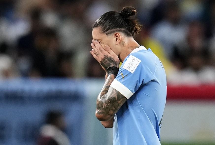 Uruguay&#039;s Darwin Nunez reacts as he leaves the pitch during the World Cup group H soccer match between Ghana and Uruguay, at the Al Janoub Stadium in Al Wakrah, Qatar, Friday, Dec. 2, 2022. (AP P ...