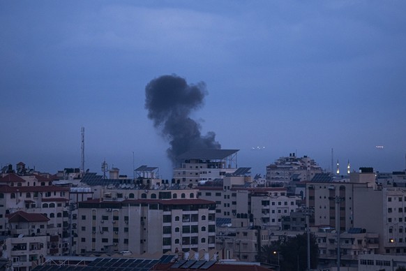Smoke rises following an Israeli airstrike in the western Gaza Strip, Thursday, Feb. 23, 2023. The Israeli military said Palestinian militants fired six rockets from the Gaza Strip toward the country& ...