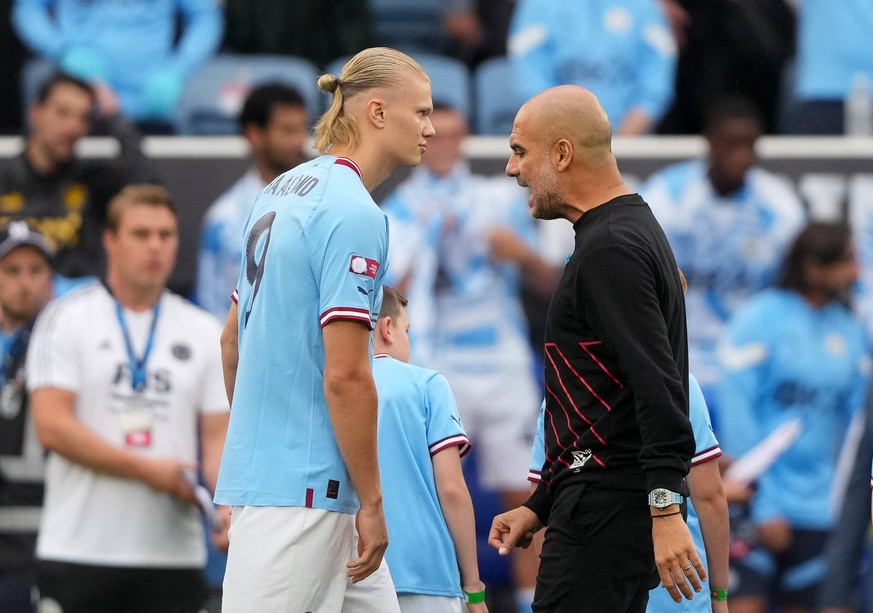 Erling Braut Haaland of Man City &amp; Man City manager Pep Guardiola during the The FA Community Shield Final match between Liverpool and Manchester City at the King Power Stadium, Leicester, England ...