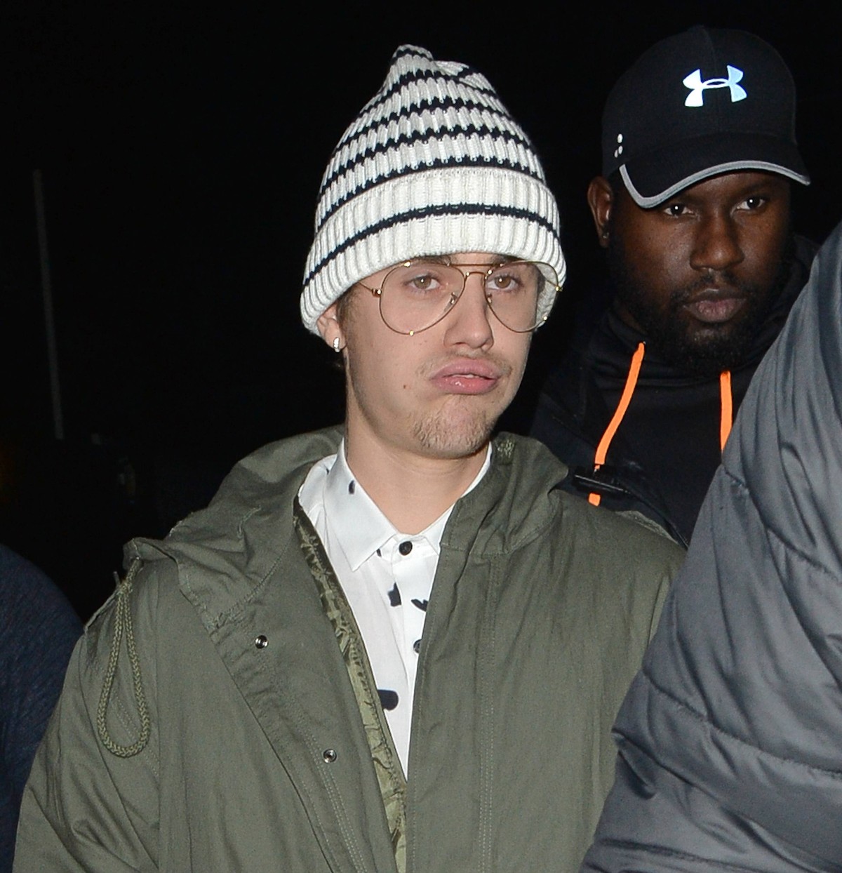 Canadian pop star Justin Bieber is spotted looking a little worse for wear as he leaves the I Am Bolt afterparty at Tape night club. The 22-year-old arrives looking sharp in a suit but leaves the part ...
