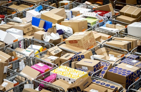 Packages are ready for shipment in the parcel sorting center of post and parcel delivery company PostNL in Sassenheim on November 10, 2020, in the run-up to Black Friday, Sinterklaas and Christmas, ma ...