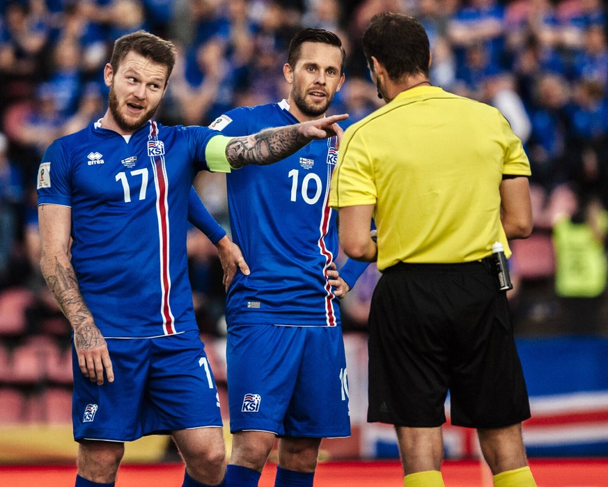 September 2, 2017 - Tampere, Finland - Iceland s Aron Gunnarsson is yellow carded during the FIFA World Cup WM Weltmeisterschaft Fussball 2018 Group I football qualification match between Finland and  ...