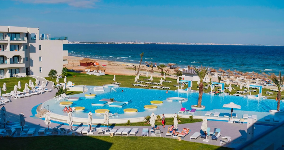 Beautiful tropical beach front hotel resort with swimming pool