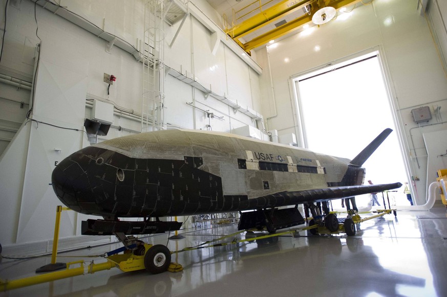 The X-37B Orbital Test Vehicle (OTV), the Air Force s unmanned, reusable space plane, landed at Vandenberg Air Force Base at 5:48 a.m. (PDT) June 16, 2012. OTV-2, which launched from Cape Canaveral Ai ...