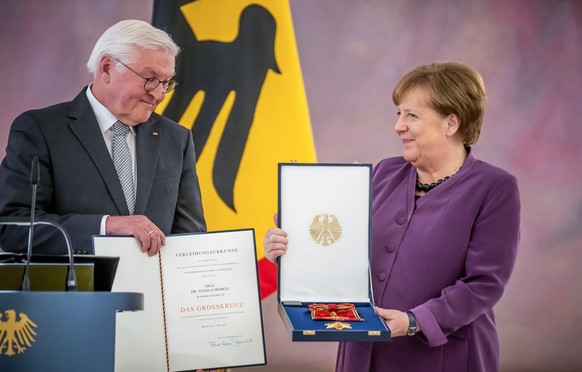 April 17, 2023, Berlin: Angela Merkel (CDU), former Chancellor, receives the Grand Cross of the Order of Merit of the Federal Republic of Germany in special honor from Federal President Frank-Walter Steinmeier.