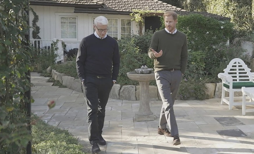 In this video grab provided by 60 Minutes, Anderson Cooper, left, and Prince Harry are seen during an interview. The interview is set to air Sunday, Jan 8 on &quot;60 Minutes.&quot; (CBS/60 Minutes vi ...