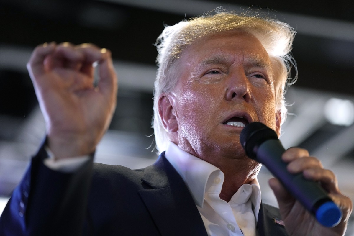 FILE - Republican presidential candidate former President Donald Trump speaks to supporters during a visit to the Iowa State Fair, Saturday, Aug. 12, 2023, in Des Moines, Iowa. Trump’s response this w ...